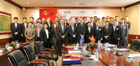 Delegates gather for a group photograph at the centre opening ceremony.