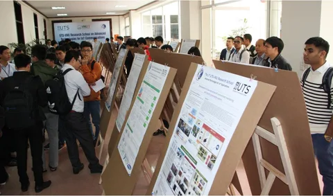 Researchers and students discuss research posters at RS2017.