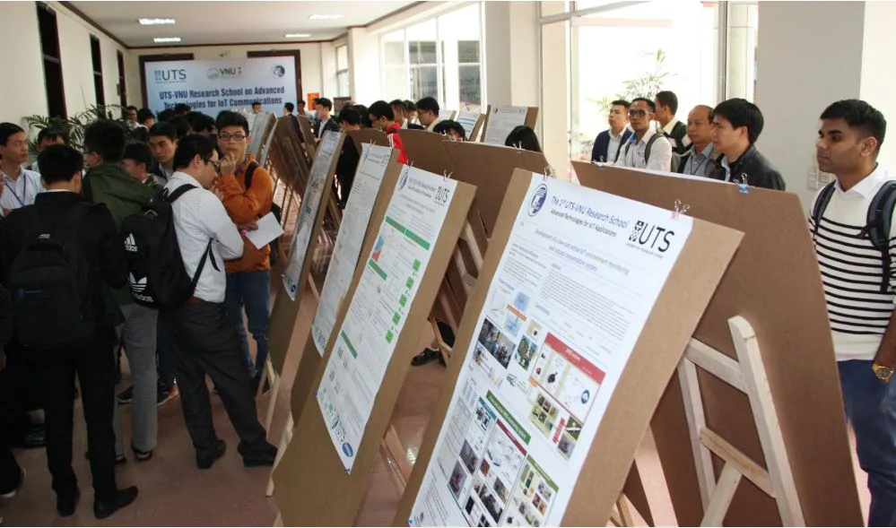 Researchers and students discuss research posters at RS2017.